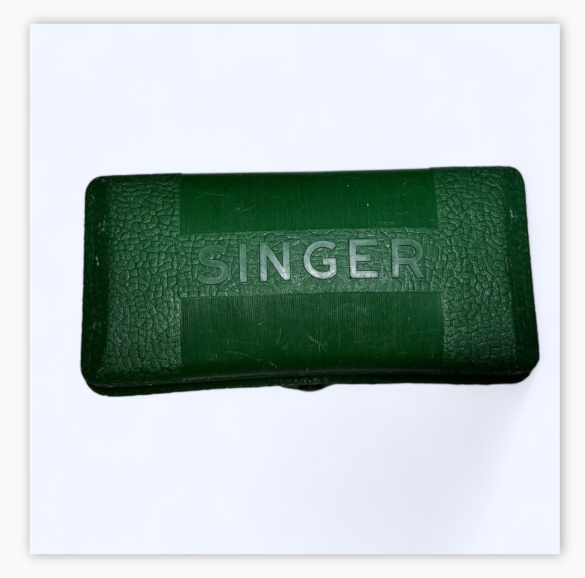 Singer ButtonHoler
